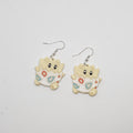 White gold dangle Pokemon Togepi earrings made out of polymer clay.