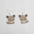 White gold dangle pokemon Eevee earrings made out of polymer clay. 